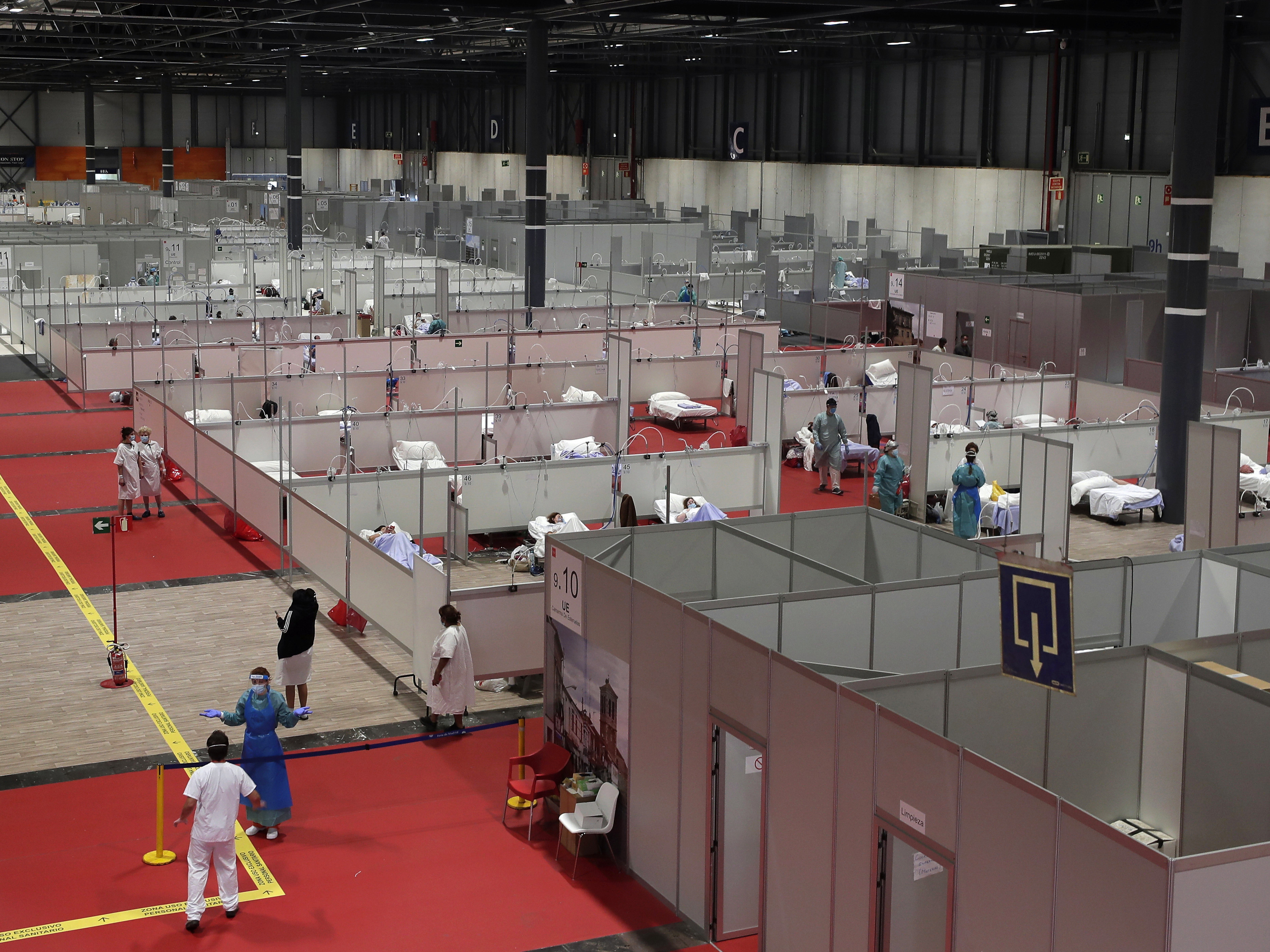 caption: A temporary field hospital set up at IFEMA Convention Center in Madrid, Spain, on Thursday. Spain is one of the countries hit hardest by the coronavirus pandemic.