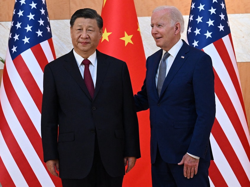 caption: U.S. President Joe Biden and China's President Xi Jinping are shown meeting on the sidelines of the G20 Summit in Nusa Dua on the Indonesian resort island of Bali on November 14, 2022.