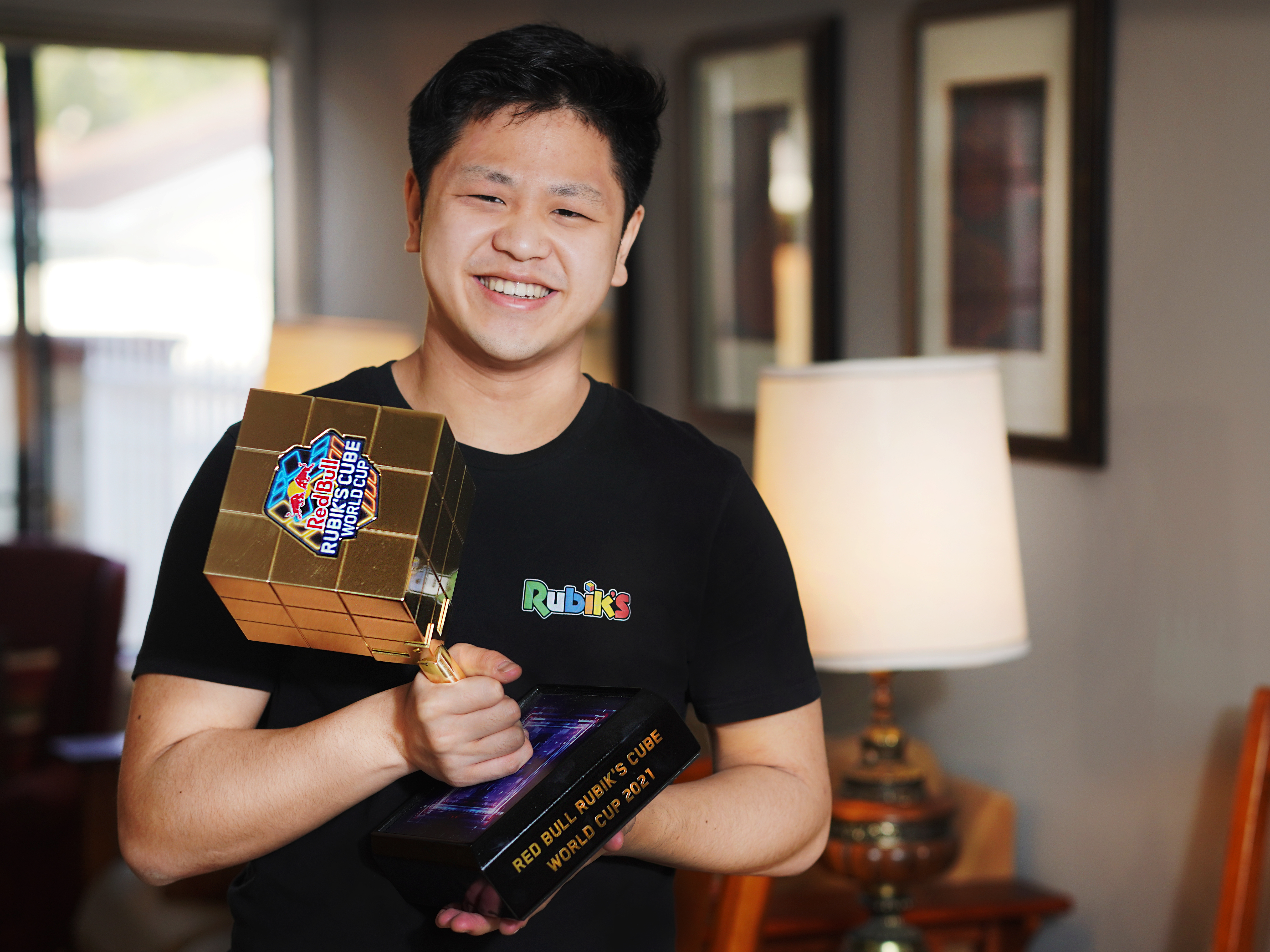 caption: Max Park, pictured after winning a December 2021 competition, recently set a world record for solving a 3x3x3 Rubik's cube in 3.13 seconds.