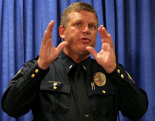 caption: In this file photo from 2005, then Phoenix police Lt. Frank Milstead describes the circumstances surrounding an arrest.