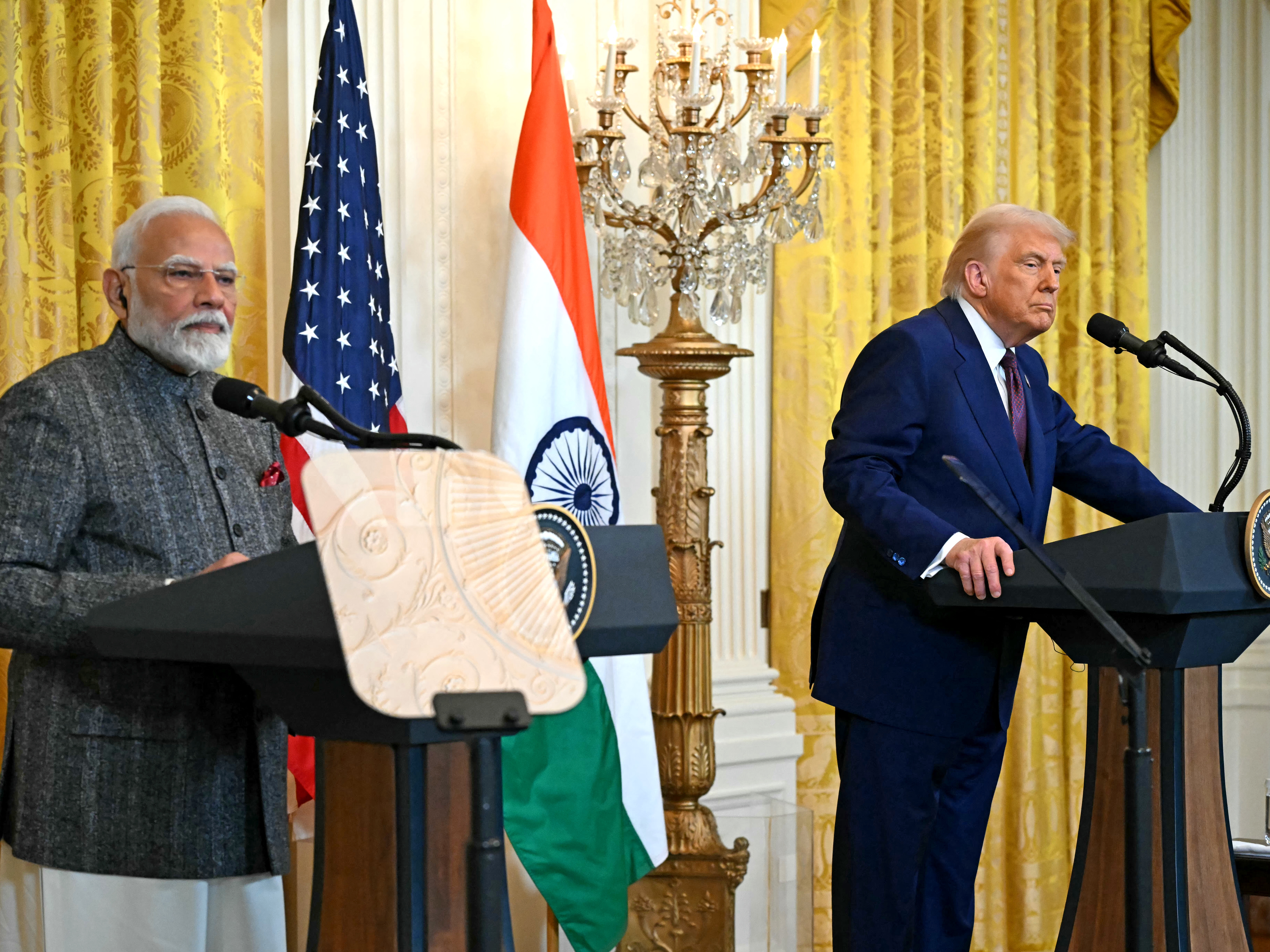 caption: President Trump and Indian Prime Minister Narendra Modi hold a joint press conference in the East Room of the White House on Feb. 13.