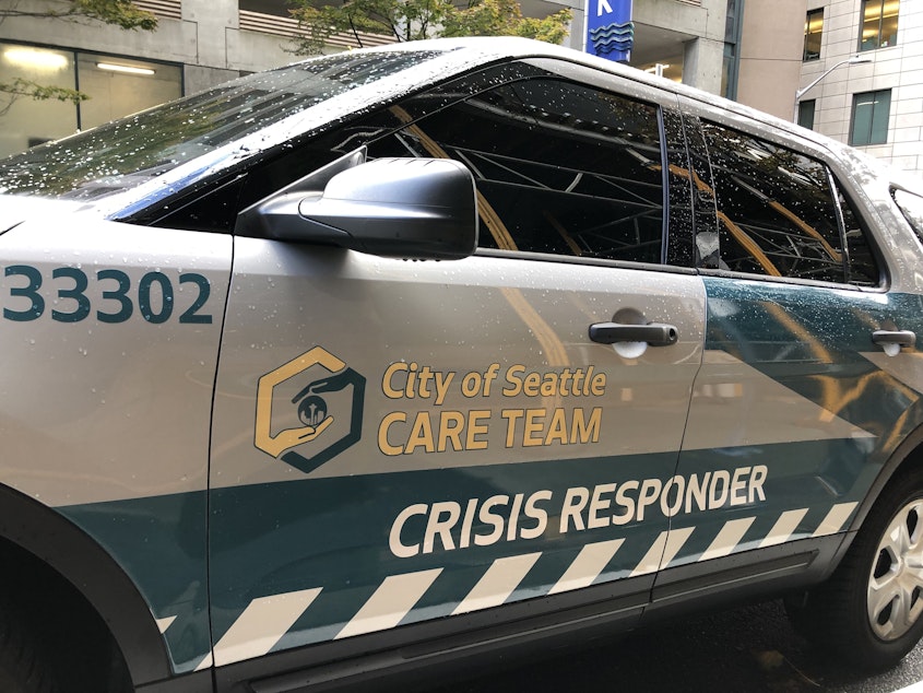 caption: Employees say the CARE team logo is meant to be approachable and signal that the responders are independent from Seattle police and fire departments. The team will also have a van with a wheelchair lift to transport people wherever they need to go. 