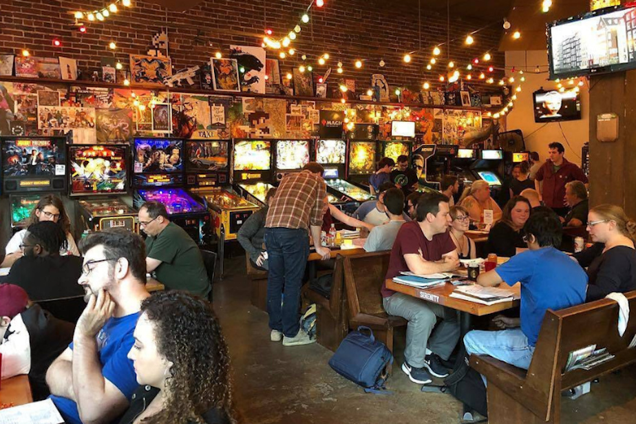 caption: Raygun Lounge is in Seattle's Capitol Hill neighborhood. It's all ages and dog friendly. Lots of pinball machines, and tables for board games. 