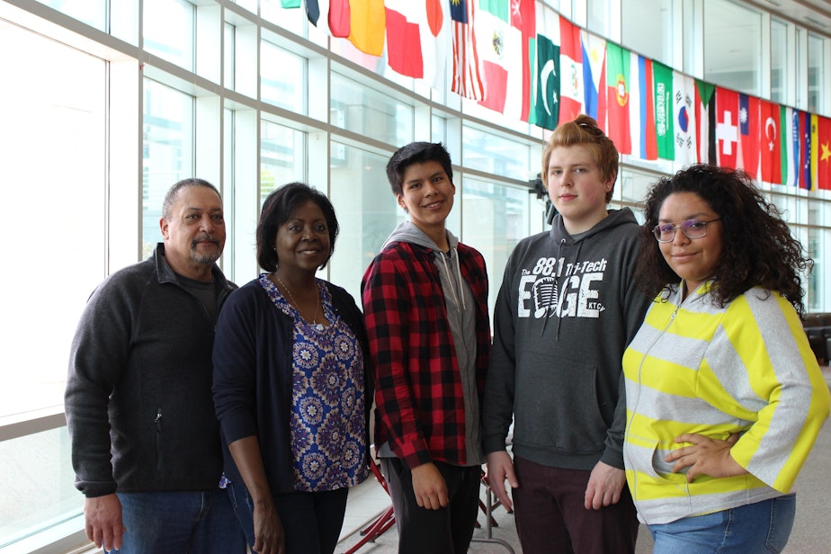 caption: Zech Cyr, Joshua Sivonen, and Anisa Rodriguez produced this story with support from mentor Esmy Jimenez. Special thanks to Vanessa and Leonard Moore (on left) of the Tri-Cities African American Community, Cultural, and Educational Society.