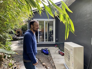 caption: James Tucker got an efficient heat pump for his home near Oakland, Calif., last year. Now homeowners can get new credits for heat pumps from federal climate legislation.