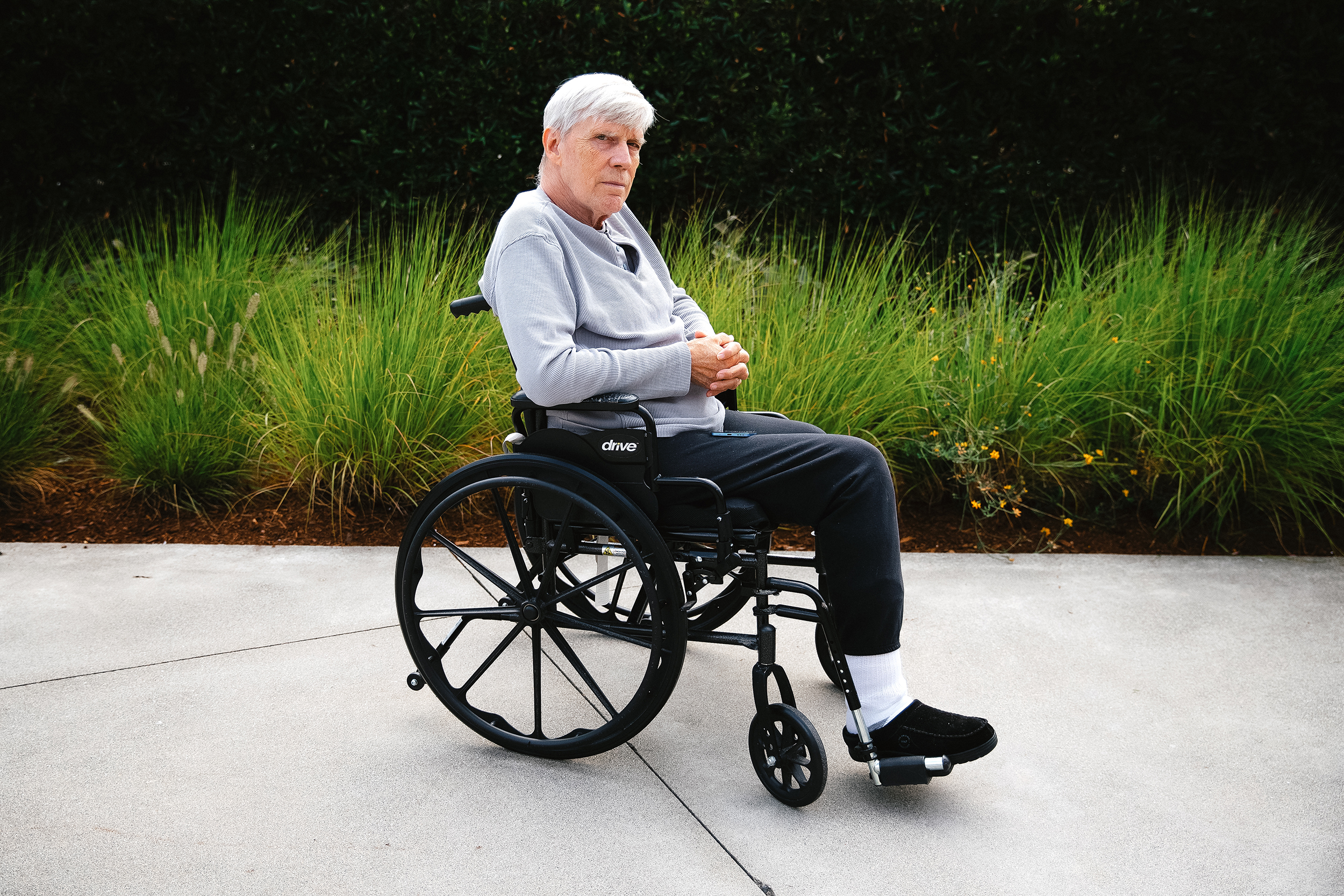 caption: Joe Beck, 72, is portrayed on Thursday, July 31, 2025, outside his apartment building in Marysville, Washington. 