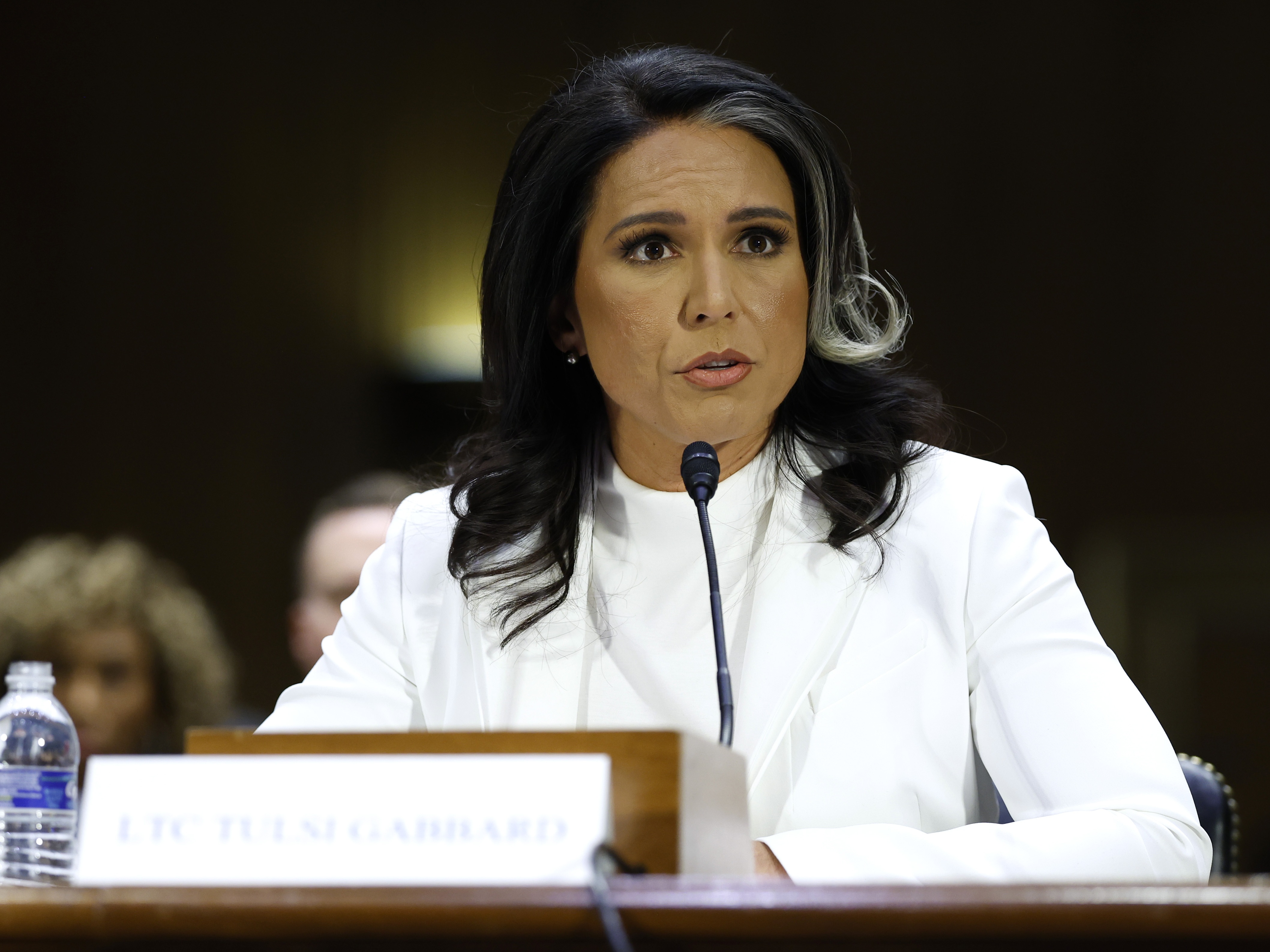 caption: Tulsi Gabbard, President Donald Trump's nominee to be director of national intelligence, testifies during her confirmation hearing before the Senate Intelligence Committee on Jan. 30 in Washington, D.C.