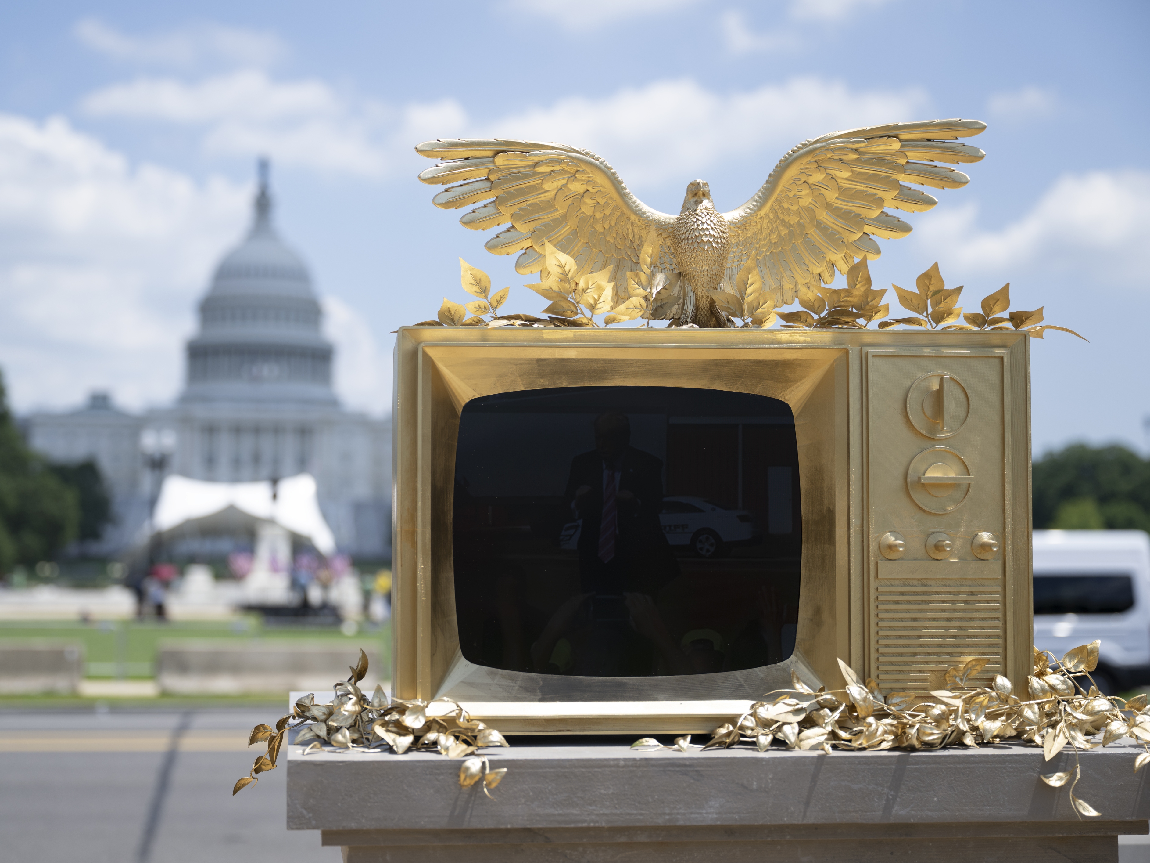 KUOW - A statue of Trump and Epstein holding hands in D.C. is removed as  fast as it appeared