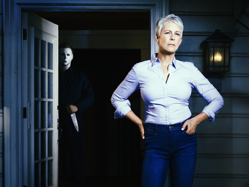 caption: Watch out, Michael Myers, Laurie Strode [Jamie Lee Curtis] is ready for you.