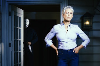 caption: Watch out, Michael Myers, Laurie Strode [Jamie Lee Curtis] is ready for you.