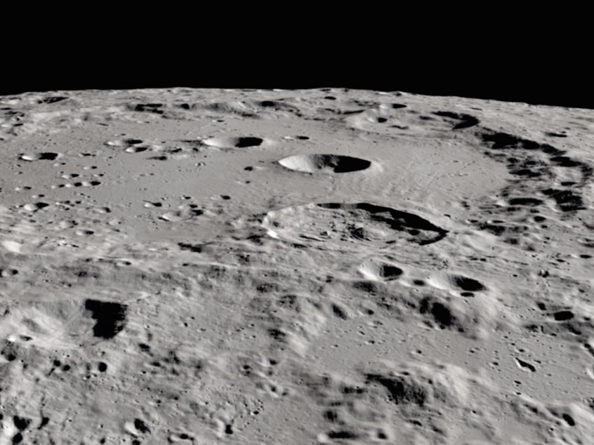 caption: Researchers have detected water molecules in Clavius crater, in the moon's southern hemisphere. The large crater is visible from Earth.