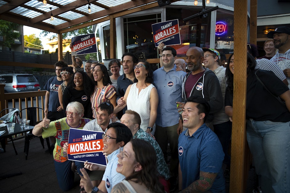caption: Friends and supporters of Seattle City Council incumbent Tammy Morales, representing District 2, pose for a group photograph during a primary election night gathering on Tuesday, August 1, 2023, at Taco City Taqueria along Rainier Avenue South in Seattle. 