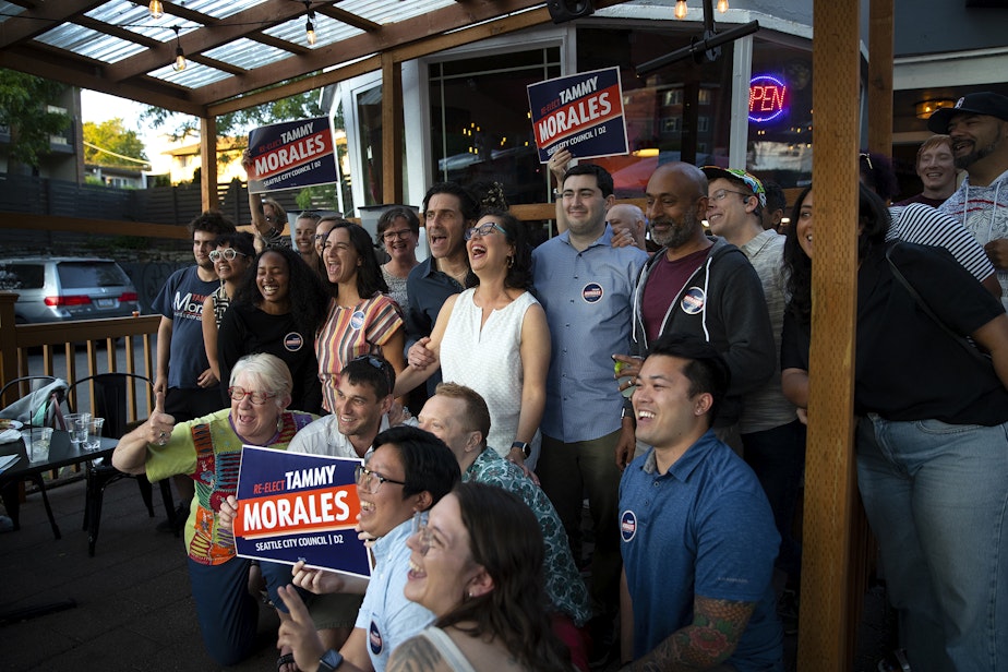 caption: Friends and supporters of Seattle City Council incumbent Tammy Morales, representing District 2, pose for a group photograph during a primary election night gathering on Tuesday, August 1, 2023, at Taco City Taqueria along Rainier Avenue South in Seattle.