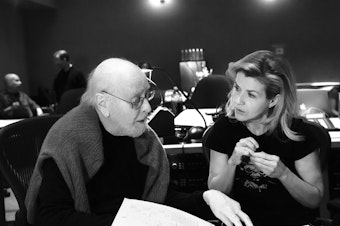 caption: Composer John Williams and violinist Anne-Sophie Mutter during a studio session for <em>Across the Stars.</em>