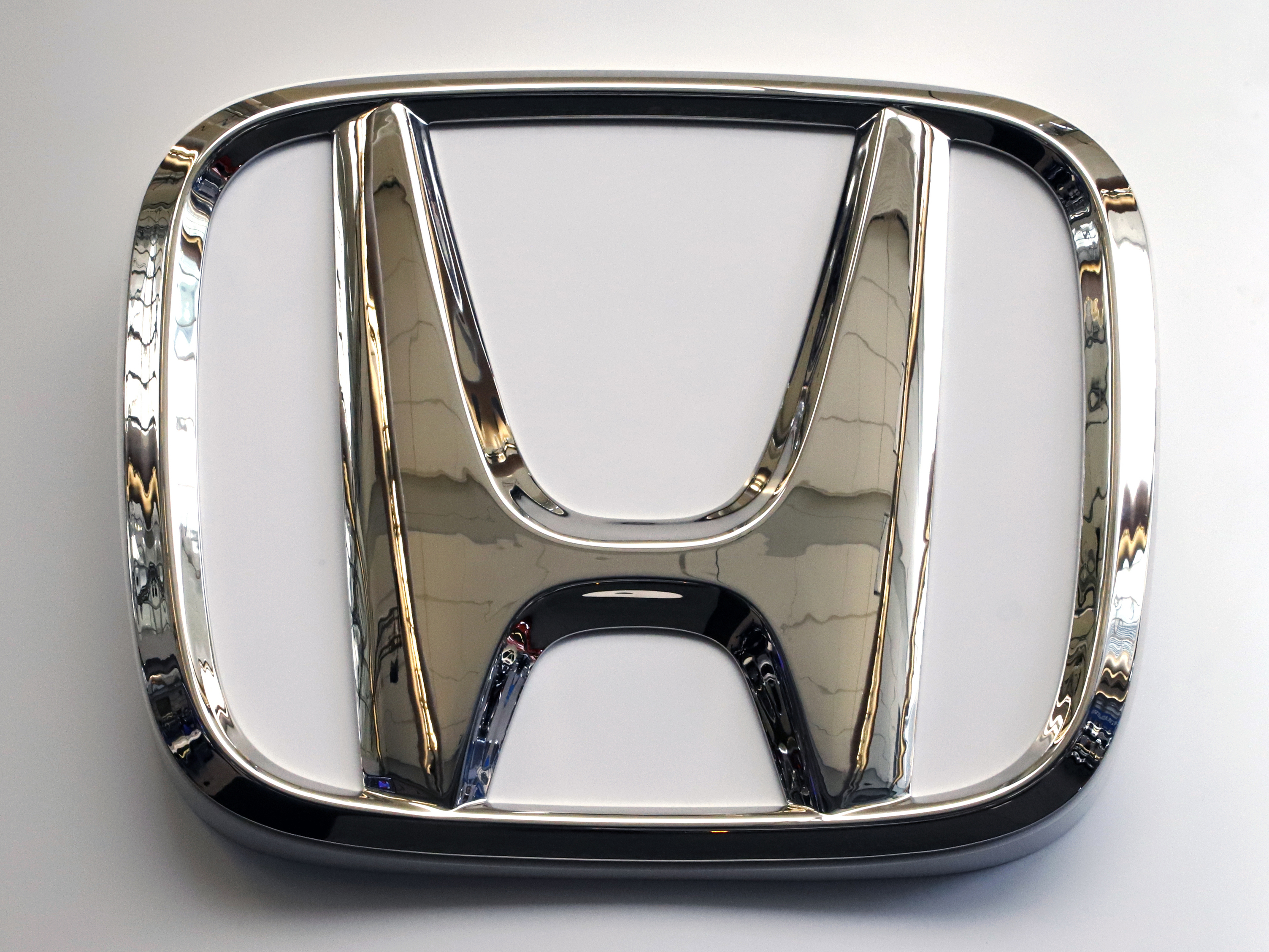 caption: Honda is recalling 330,000 Odysseys, Passports, Pilots and Ridgelines due to an issue with side-view mirrors.
