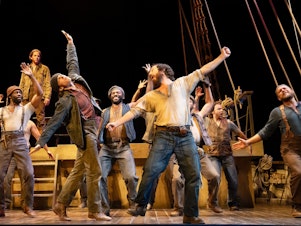 caption: With songs by The Avett Brothers, <em>Swept Away</em> is inspired by the true story of an 19th century shipwreck in which seamen resorted to cannibalism to survive.