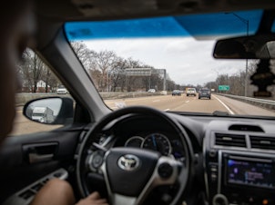 caption: Vehicles travel on Interstate 240 after the morning rush hour on a weekday in Memphis, Tenn. Highways are the fastest — and in some cases, the only — way to get from one place to another in the sprawling city.