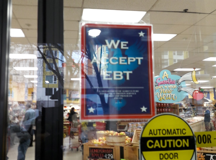 caption: More than 900,000 people in Washington are on food assistance through EBT cards. 