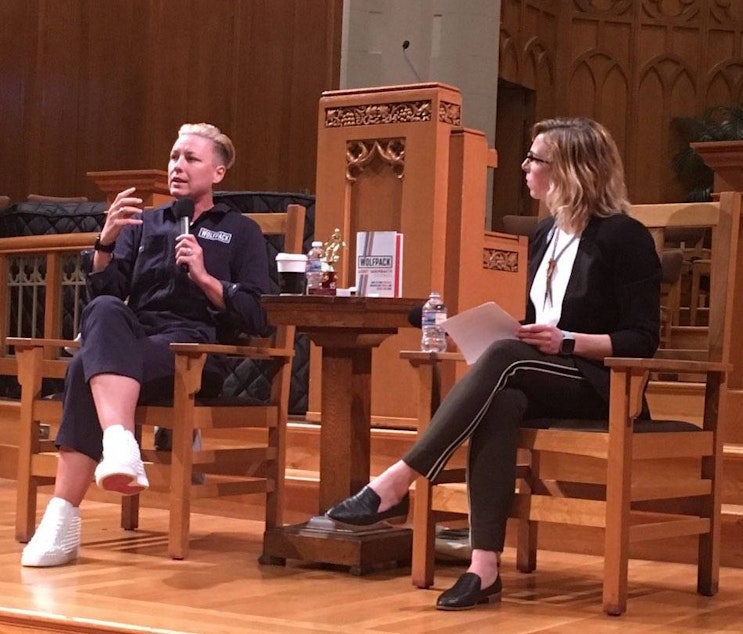 caption: Abby Wambach and Paige Browning at the Seattle First Baptist Church