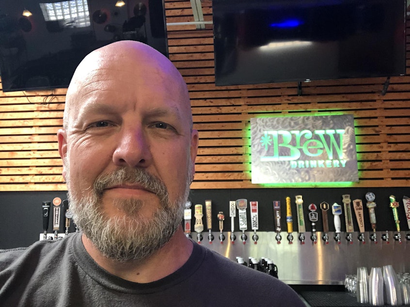 caption: Christian Piatt, co-owner of the Brew Drinkery in Granbury, Texas, was forced to close his brewery's doors due to the coronavirus less than two months after he opened.