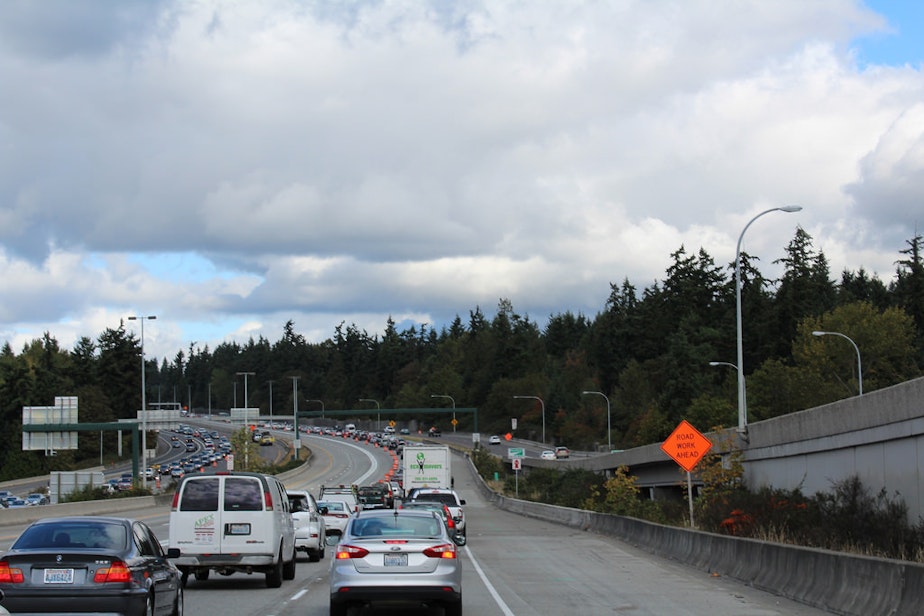 caption: Earlier this fall, I-405 was reduced to two lanes in order to allow crews to complete final striping for the new express toll lanes. After opening, they're still causing consternation for some drivers.