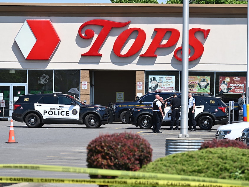 caption: A Washington state man has been arrested after allegedly calling a Buffalo, N.Y., grocery store and threatening to kill the Black people inside. This nearby Tops Grocery store in Buffalo was the scene of a deadly mass shooting in May.