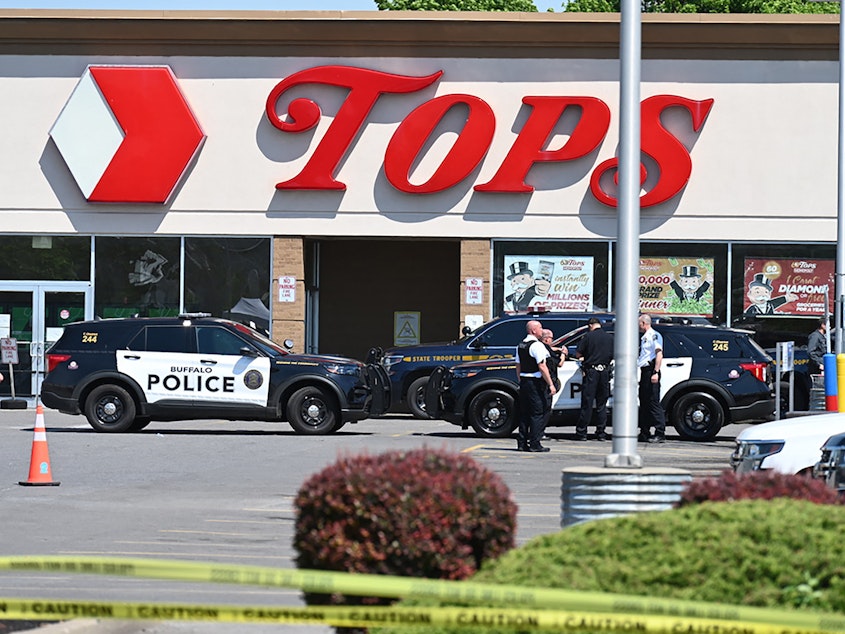 caption: A Washington state man has been arrested after allegedly calling a Buffalo, N.Y., grocery store and threatening to kill the Black people inside. This nearby Tops Grocery store in Buffalo was the scene of a deadly mass shooting in May.