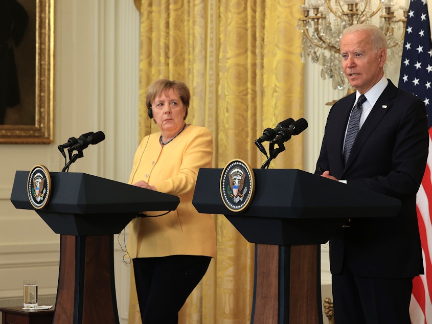 caption: German Chancellor Angela Merkel and President Biden hold a joint news conference in the White House Thursday.