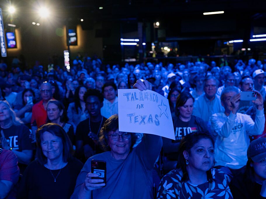 caption: People gather at a campaign rally for Texas Democratic Senate candidate James Talarico on March 2 in Houston.