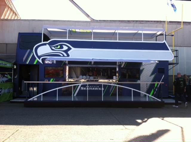 caption: This double-decker bus was imported from London to be converted into every fan's dream tailgate machine.