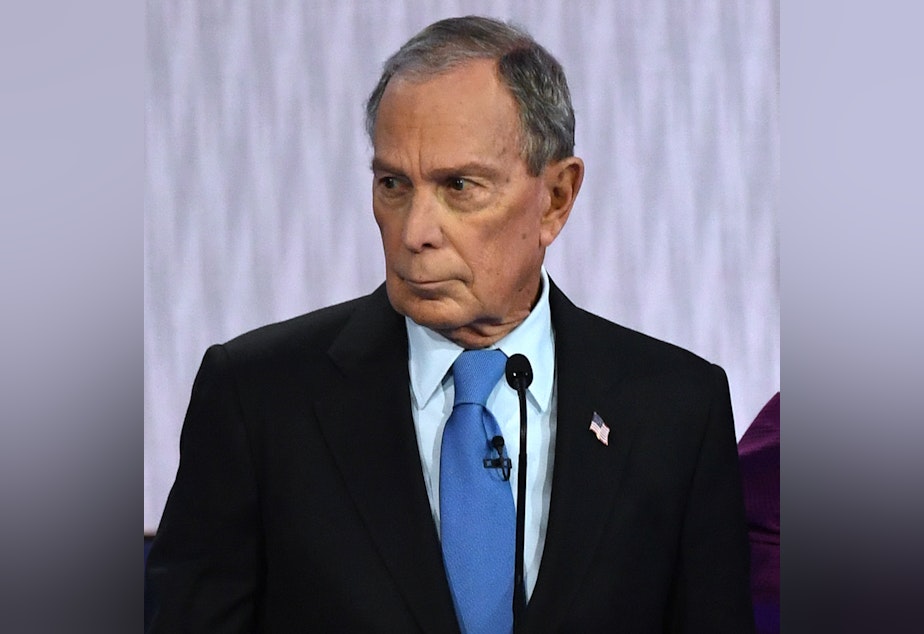 caption: Democratic presidential hopeful and former New York Mayor Mike Bloomberg looks on during a Democratic primary debate Wednesday in Las Vegas, Nevada.