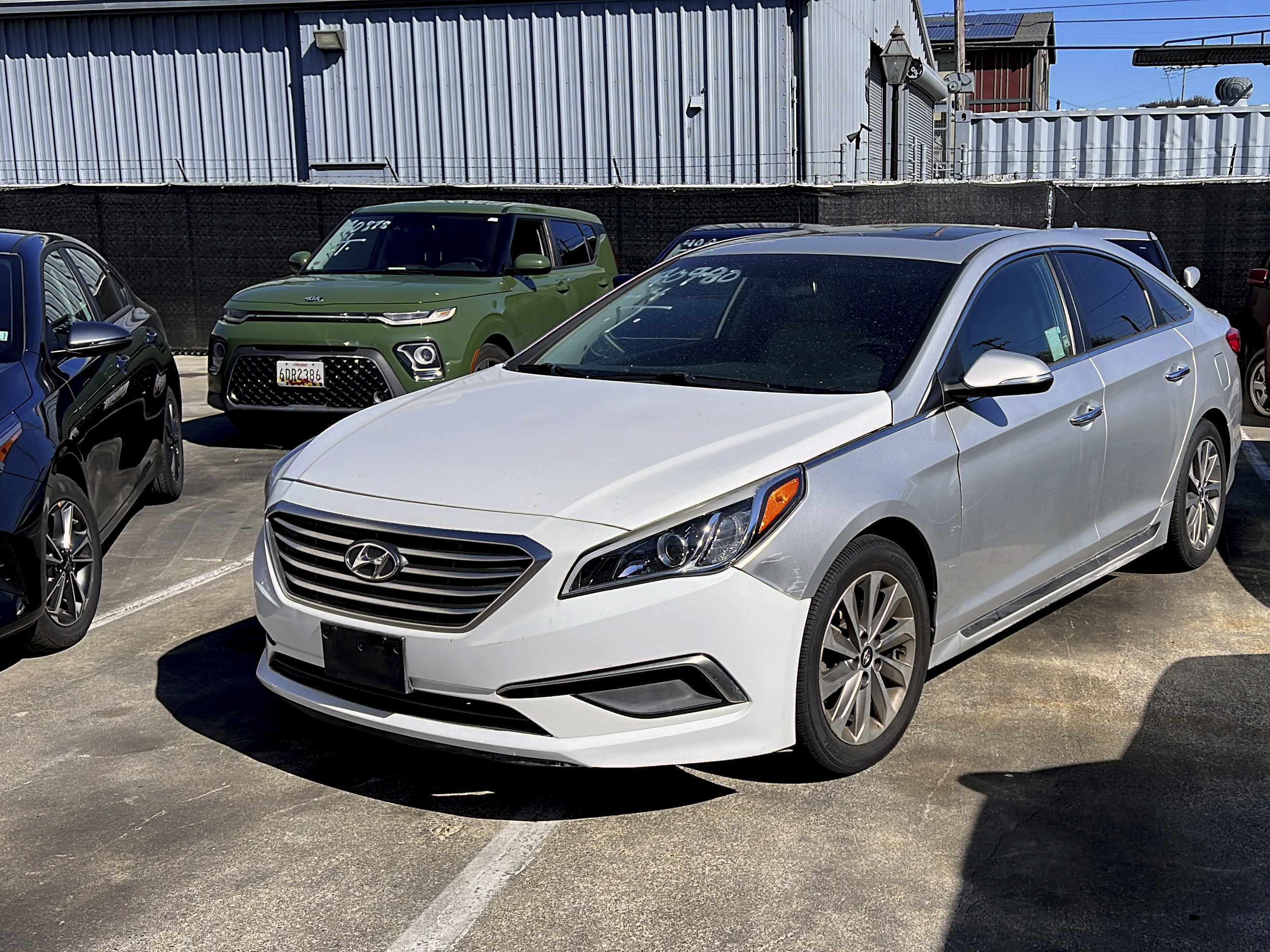 caption: A Hyundai sedan sits in the parking lot of East Bay Tow Inc., where Attorney General Rob Bonta held a news conference last month in Berkeley, Calif., about the surge in thefts of Kia and Hyundai vehicles. The Korean carmakers agreed to a $200 million settlement over claims that their cars are too easy to steal.