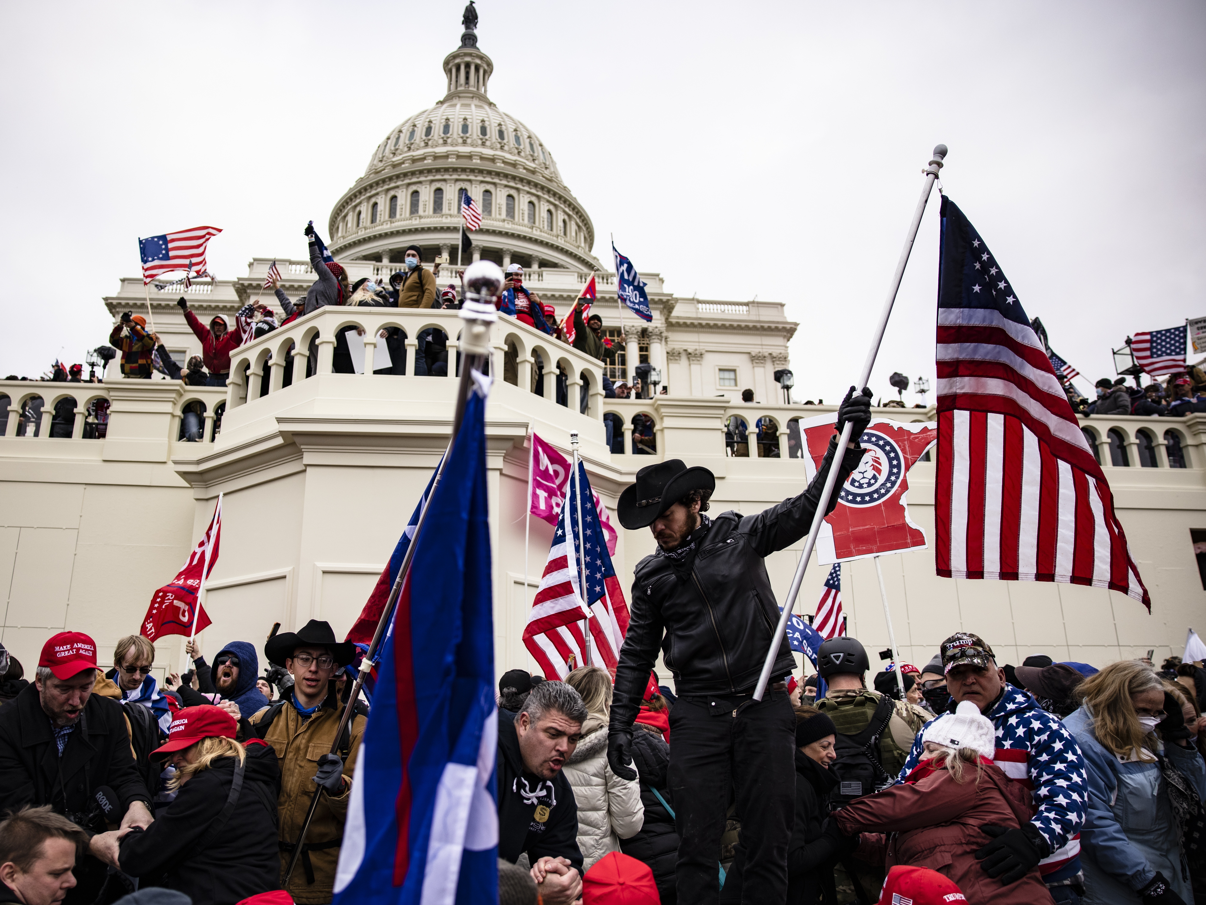 caption: Pro-Trump supporters storm the U.S. Capitol following a rally with then-President Donald Trump on January 6, 2021 in Washington, D.C.