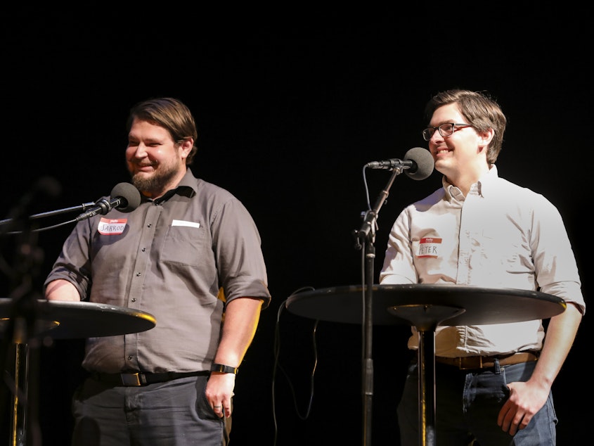 caption: Contestants Jarrod Walker and Peter Murrey play trivia games on <em>Ask Me Another</em> at TPAC's Polk Theater in Nashville, Tennessee.