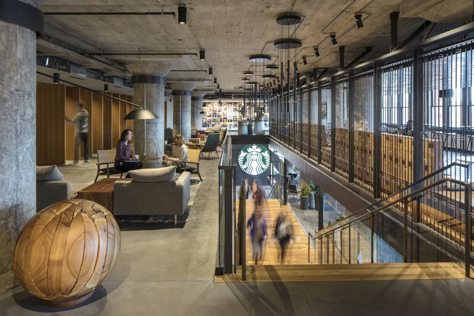 caption: A Starbucks spokesperson says after the HQ redesign, more of its work spaces will look like this, with casual spaces to gather rather than private desks.