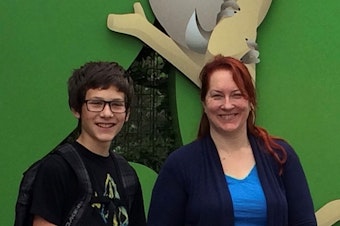 caption: Declan Daniel, 12, with his mother Penny Daniel. 