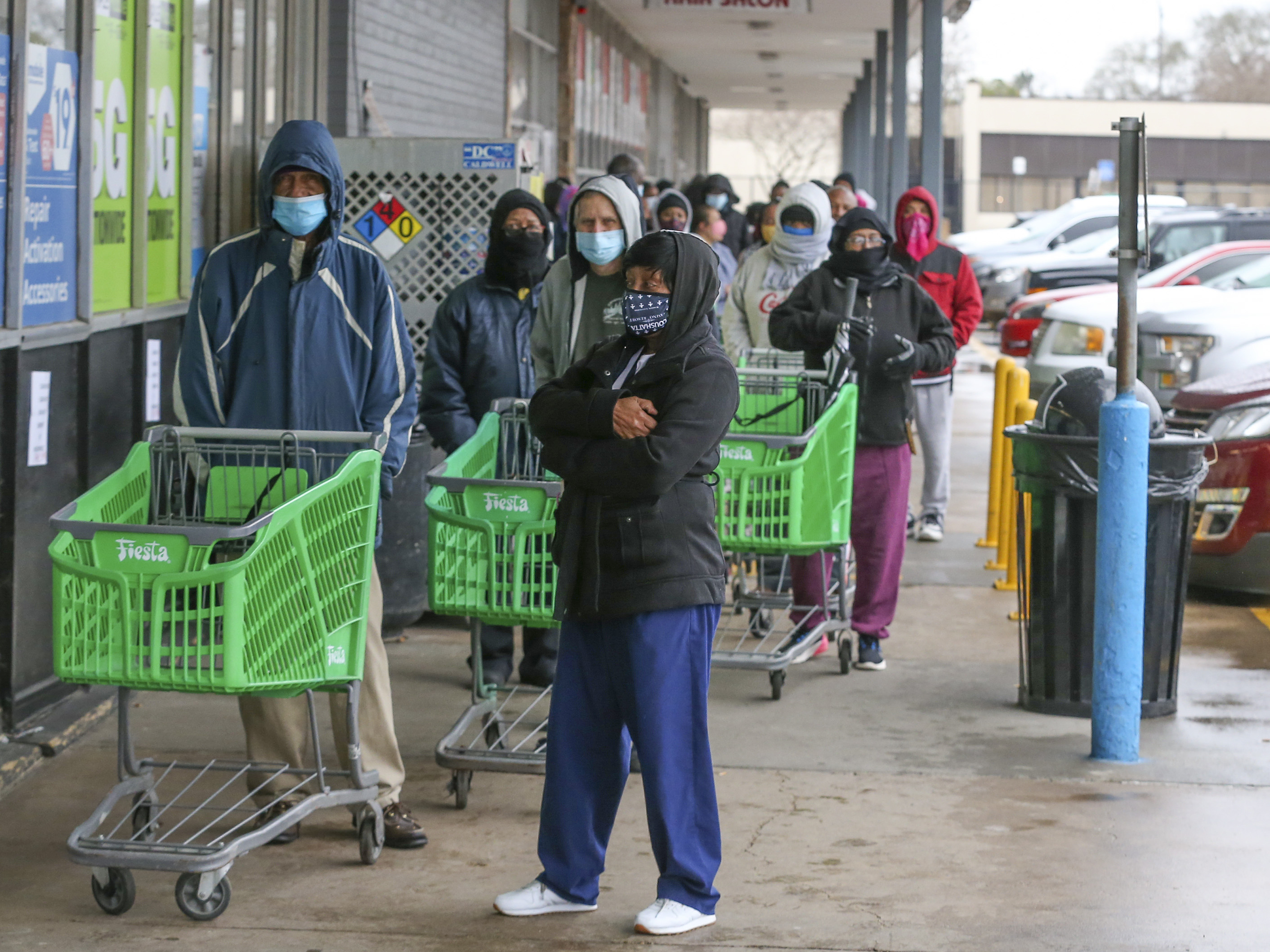 caption: Texas officials are reporting businesses are hiking up prices for food, water, and hotel rooms following a winter storm that walloped Texas this week. This is as residents wait in long lines at grocery stores and face food and water shortages.