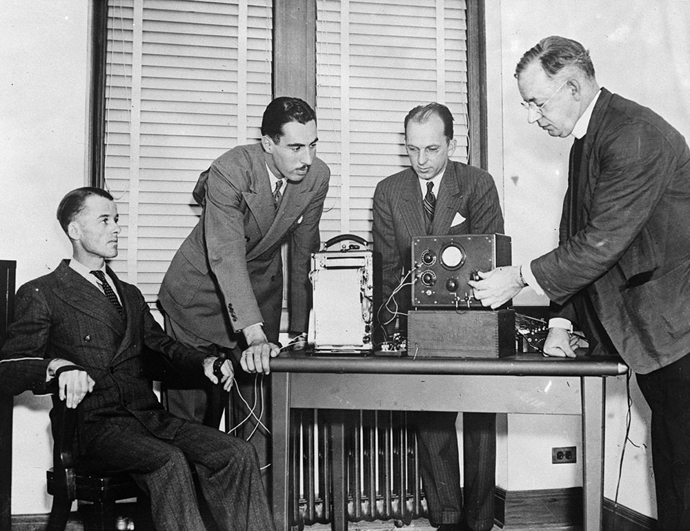 caption: Policeman Charles M. Fremgeen is submitted to a lie detector test at Fordham University. (Keystone/Getty Images)