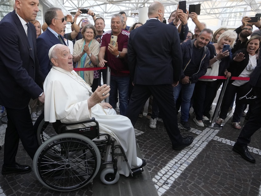 caption: Pope Francis leaves the Agostino Gemelli University Polyclinic in Rome, on Friday, nine days after undergoing abdominal surgery.