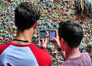 caption: Eat a chunk off the gum wall in Post Alley? Not so sure about that.