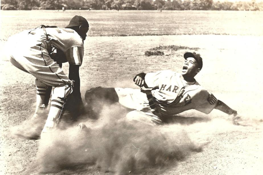 caption: Sonny Smith and Paul Hardy played for the Harlem Globetrotters baseball team, which eventually became the Seattle Steelheads. 