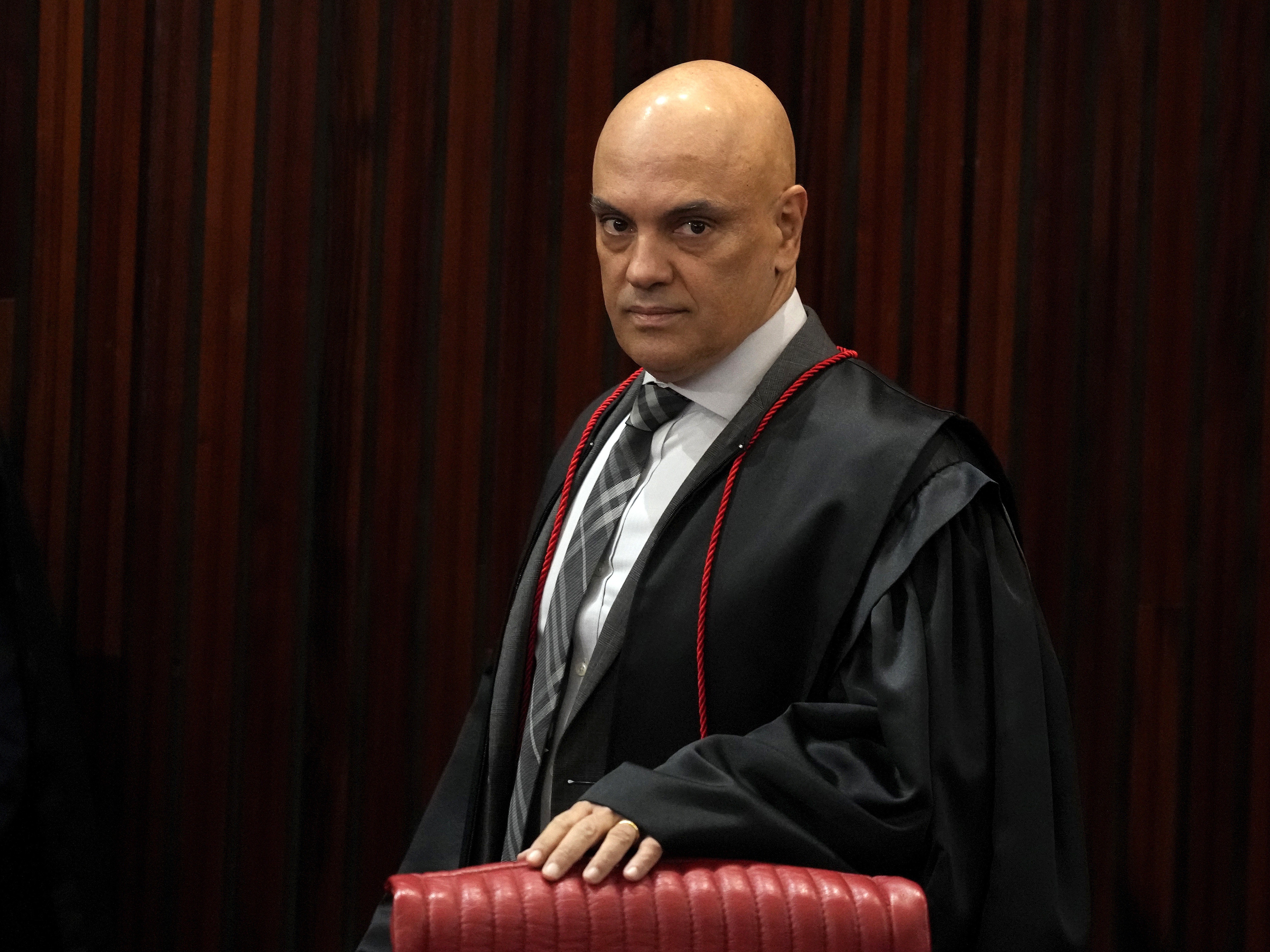 caption: Brazilian Supreme Court Chief Justice Alexandre de Moraes arrives for a court hearing, in Brasilia, Brazil, June 22, 2023.