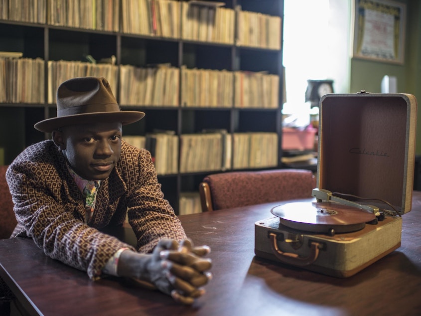 caption: "Having not grown up here, I feel I'm always educating myself on what this country is, what it has been and perhaps what it can be." J.S Ondara's debut album is <em>Tales of America.</em>