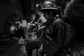 caption: Francescangeli says boys sometimes work long hours and are often tasked with pushing carts to move rocks out of the mines. "Being a child in these places is really hard," he says. "If they have some time to spend in a free way, they like to be children. But their life doesn't permit them to be children so often."