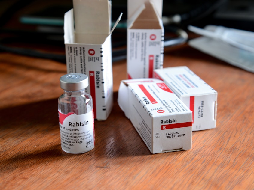 caption: Rabies is a preventable viral disease. Human fatalities are rare, and typically occur in people who don't get treatment quickly. Here, a vial and box of rabies vaccine.