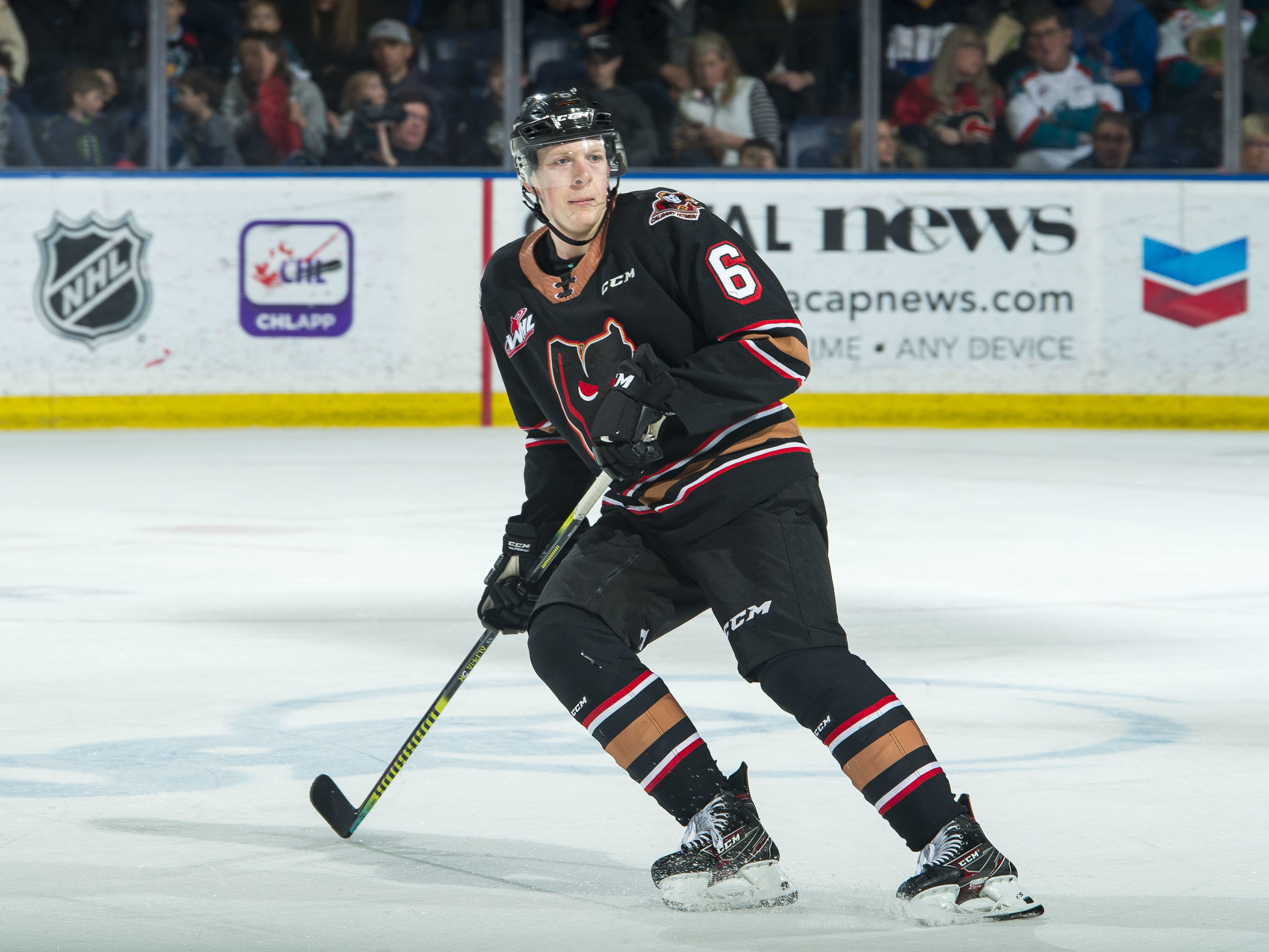 caption: Luke Prokop of the Calgary Hitmen skates against the Kelowna Rockets at Prospera Place on Feb. 17, 2020, in Kelowna, British Columbia.
