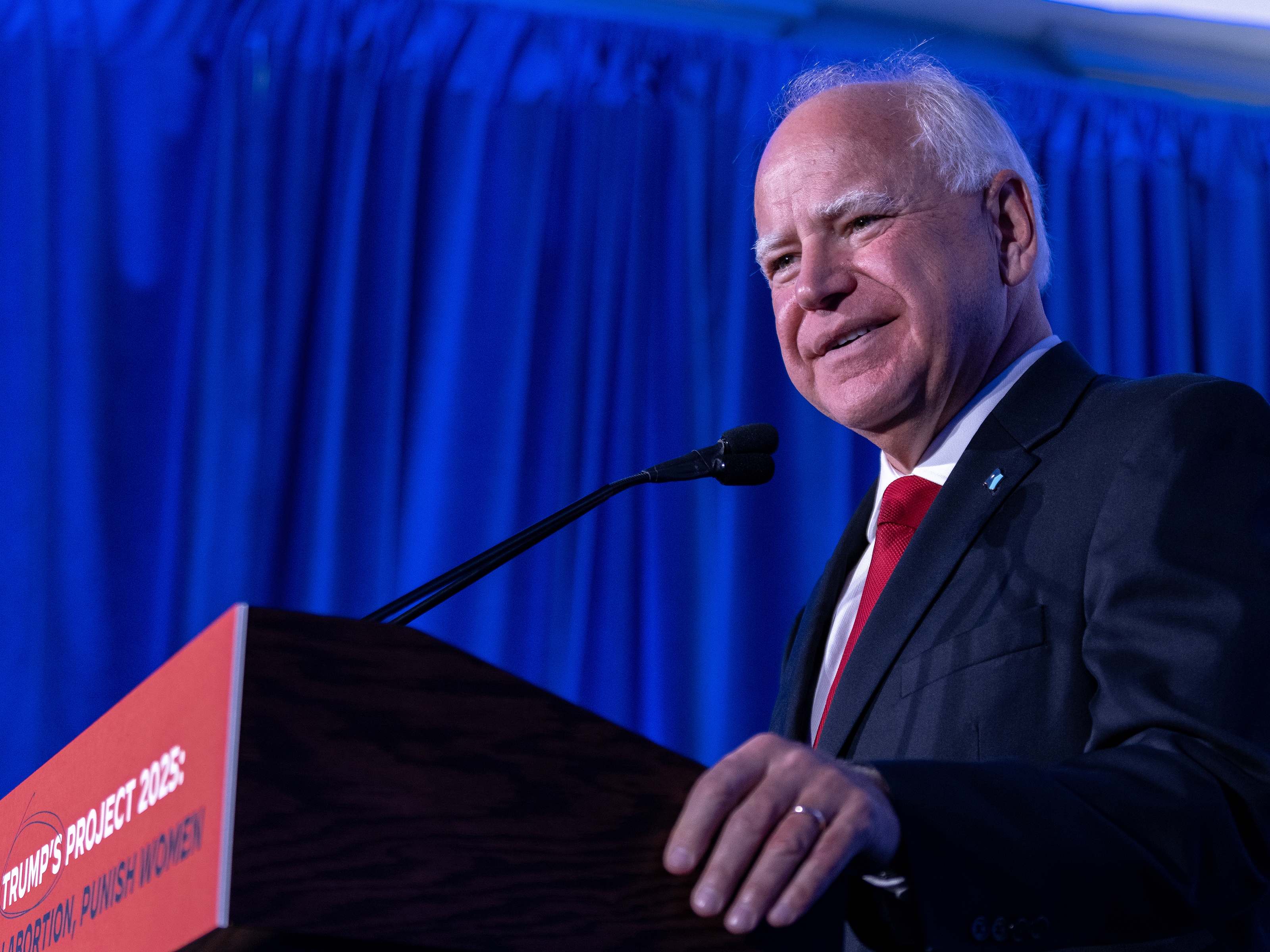 caption: Minnesota Gov. Tim Walz speaks at a DNC press conference on July 17 in Milwaukee.