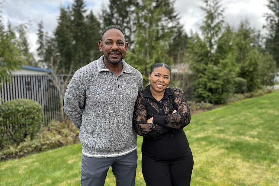 caption: Kent-based mortgage lender Michael Fornerette of Synergy One Lending, left, and real estate agent Dee Scott of Keller Williams' DeeDee Real Estate Group.