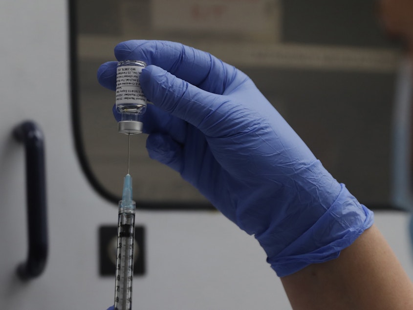 caption: Novavax says its vaccine is 100% effective against the original strain of the coronavirus and had 93% efficacy against more worrisome variants.