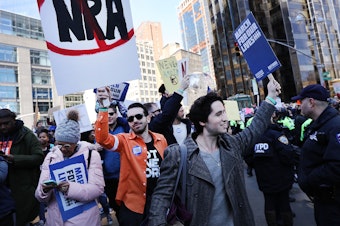 caption: Thousands of people participate in the March for Our Lives protest in New York City in March 2018.